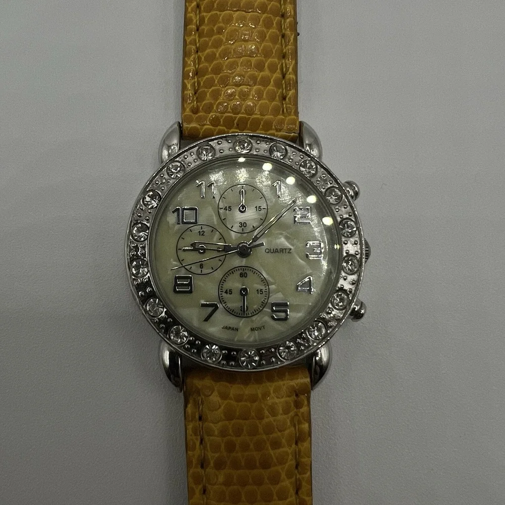 CG Women's Quartz Watch Rhinestone Bezel MOP Dial Plastic Band Needs New Battery